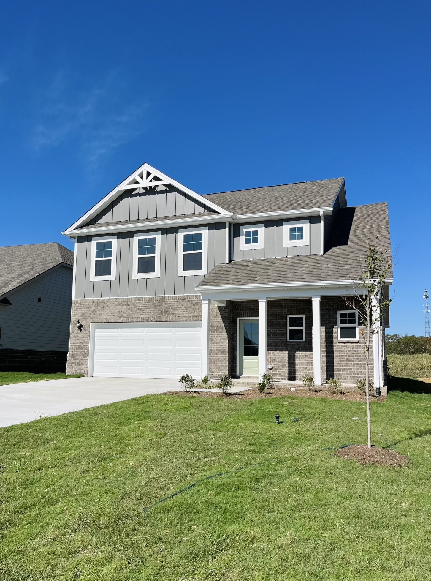 3121 Arbor Valley Rd Spring Hill Spring Hill, TN 37174 - Photo 1 of 19 a front view of a house with a yard