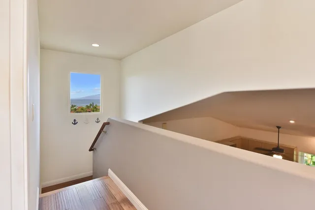 a view of balcony and wooden floor