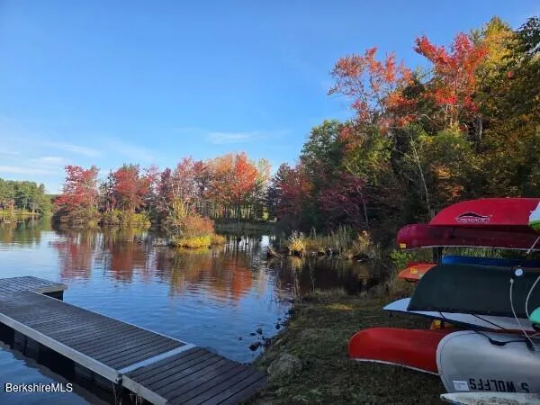a view of a lake with sitting area