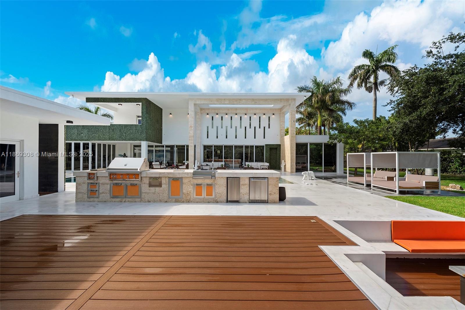 7450 Southwest 102nd Street Pinecrest, FL 33156 - Photo 18 of 51 a view of a swimming pool with seating space