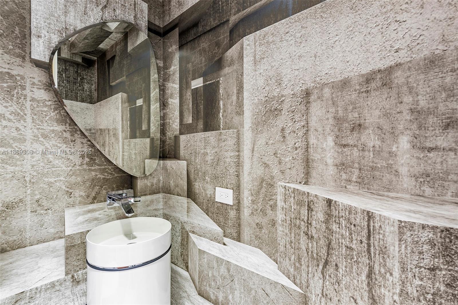 7450 Southwest 102nd Street Pinecrest, FL 33156 - Photo 20 of 51 a bathroom with a sink and mirror