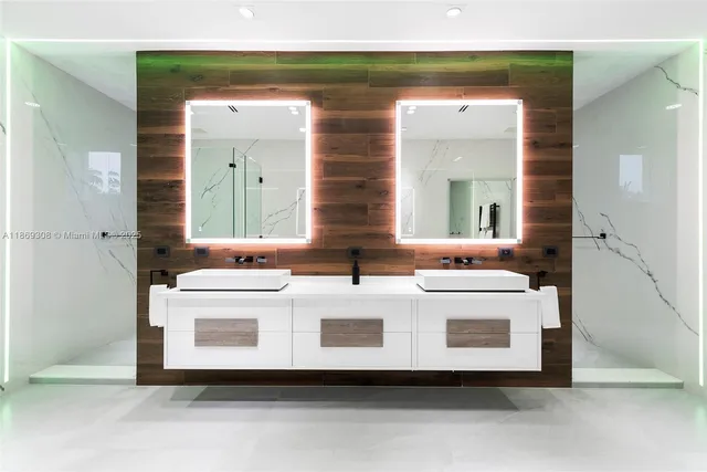 a bathroom with a sink a vanity and a mirror