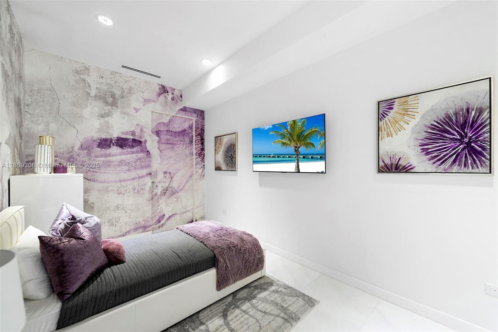 7450 Southwest 102nd Street Pinecrest, FL 33156 - Photo 38 of 51 a bedroom with a bed and a painting on the wall