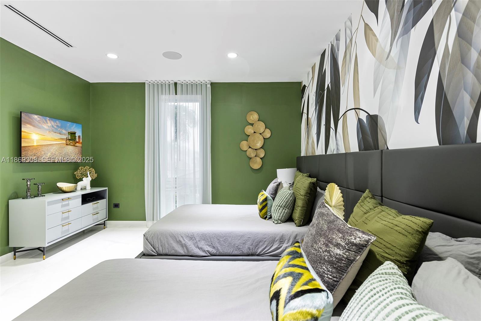 7450 Southwest 102nd Street Pinecrest, FL 33156 - Photo 41 of 51 a bedroom with a bed and dresser