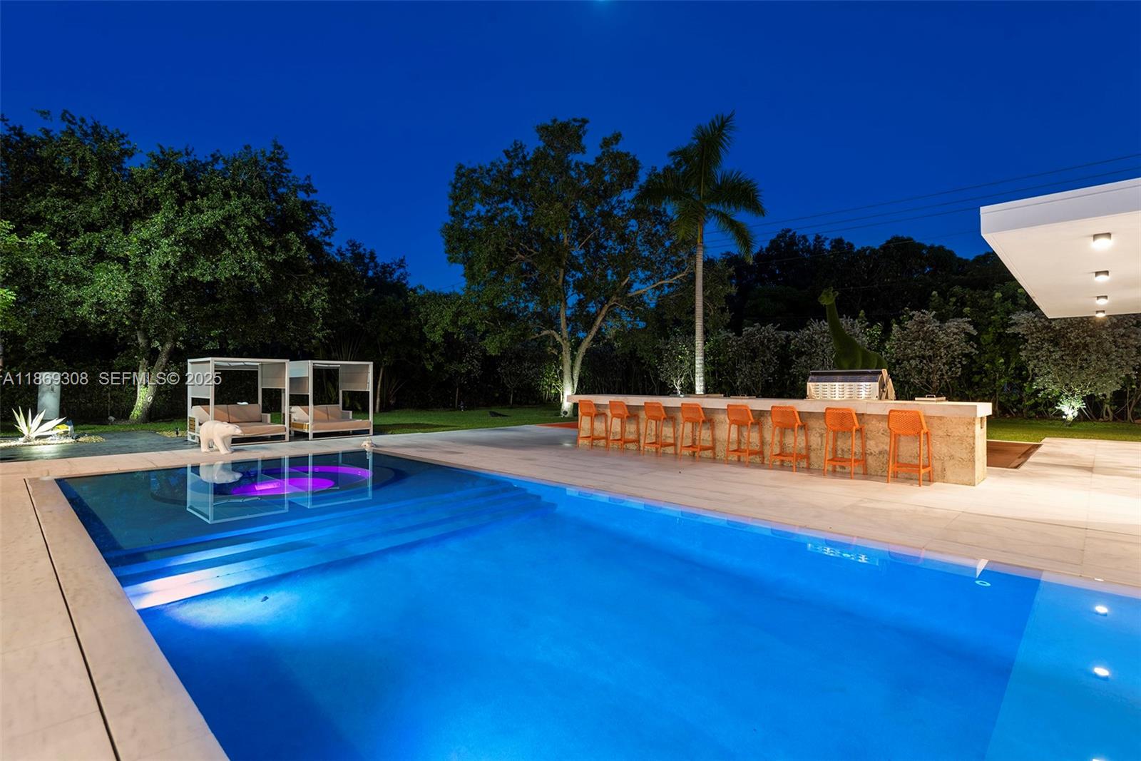 7450 Southwest 102nd Street Pinecrest, FL 33156 - Photo 45 of 51 a view of an chairs and tables on the patio
