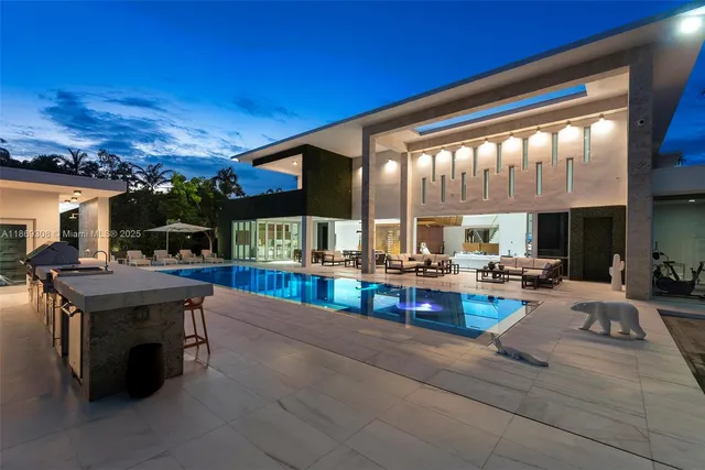 a view of a house with swimming pool
