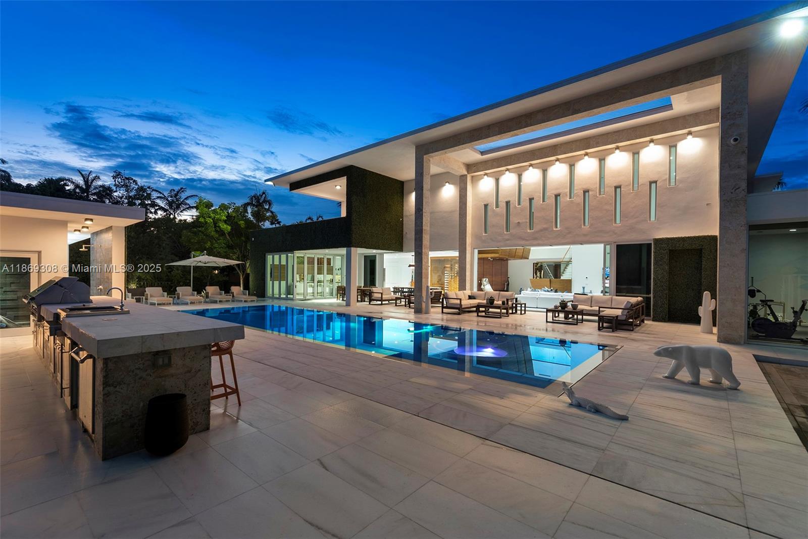 7450 Southwest 102nd Street Pinecrest, FL 33156 - Photo 47 of 51 a living room with fireplace furniture and a large window