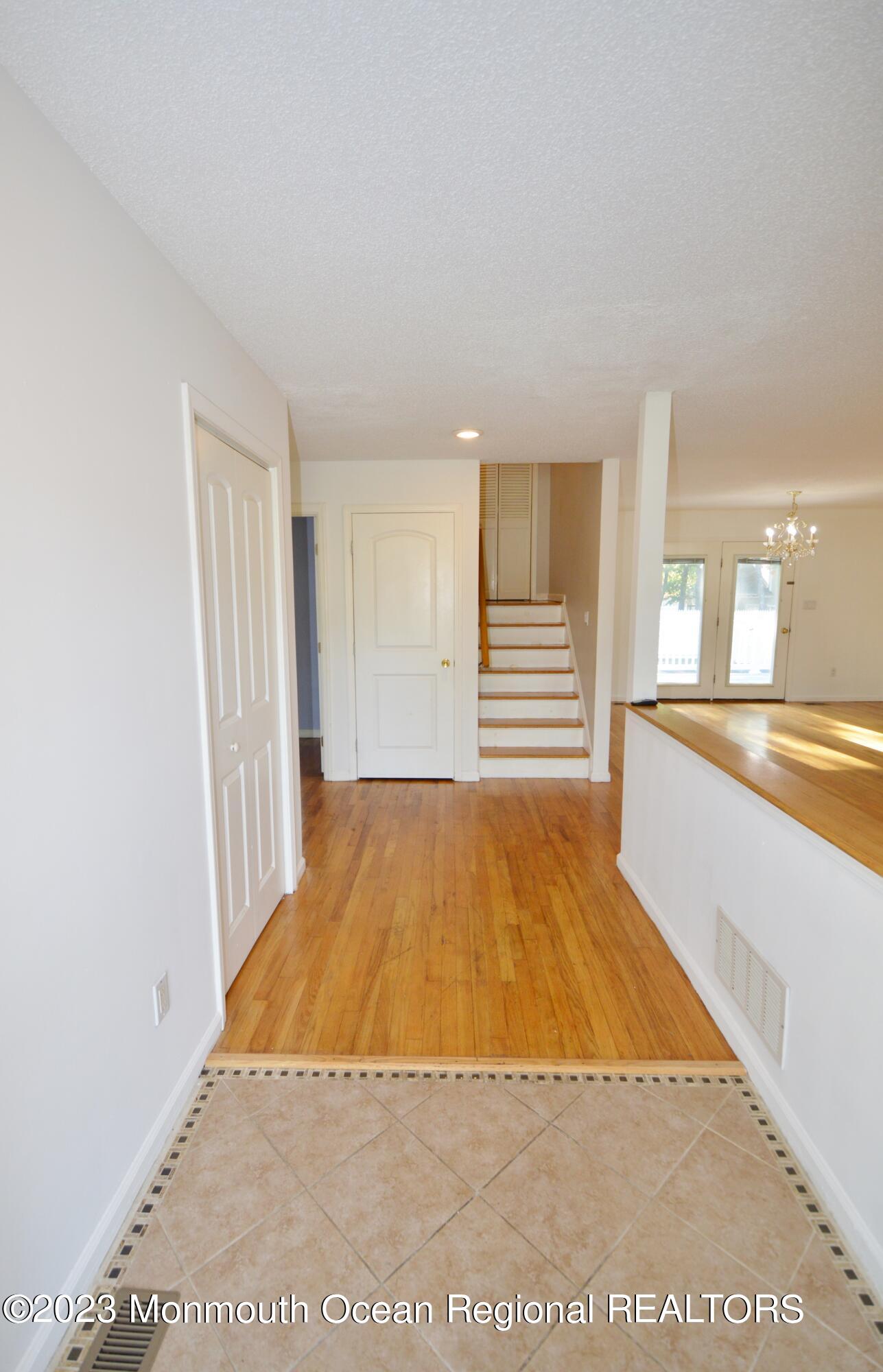 271 Sextant Road Manahawkin, NJ 08050 - Photo 4 of 48 a view of an empty room with a window