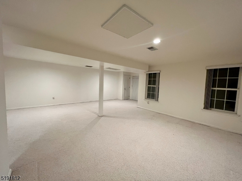 22 Constitution Way Bernards, NJ 07920 - Photo 17 of 19 a view of an empty room with a window