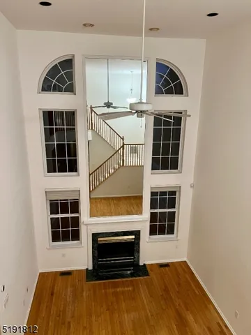 a view of a windows and fireplace in a room