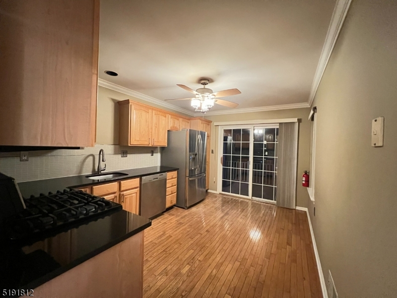 22 Constitution Way Bernards, NJ 07920 - Photo 6 of 19 a large kitchen with granite countertop a stove and a sink