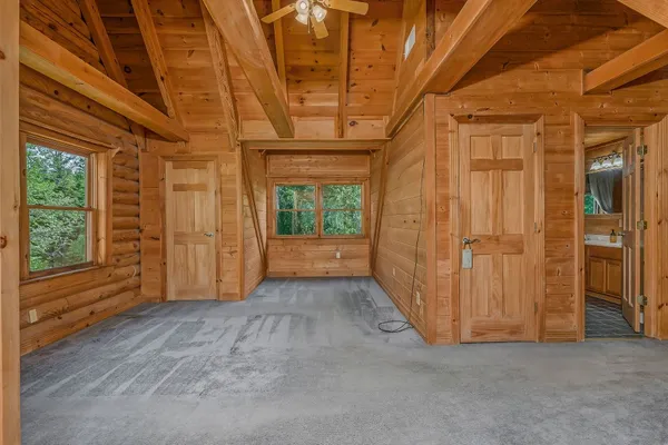 a view of entryway with wooden walls