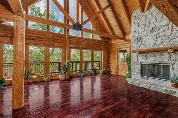 a view of an entryway with wooden floor