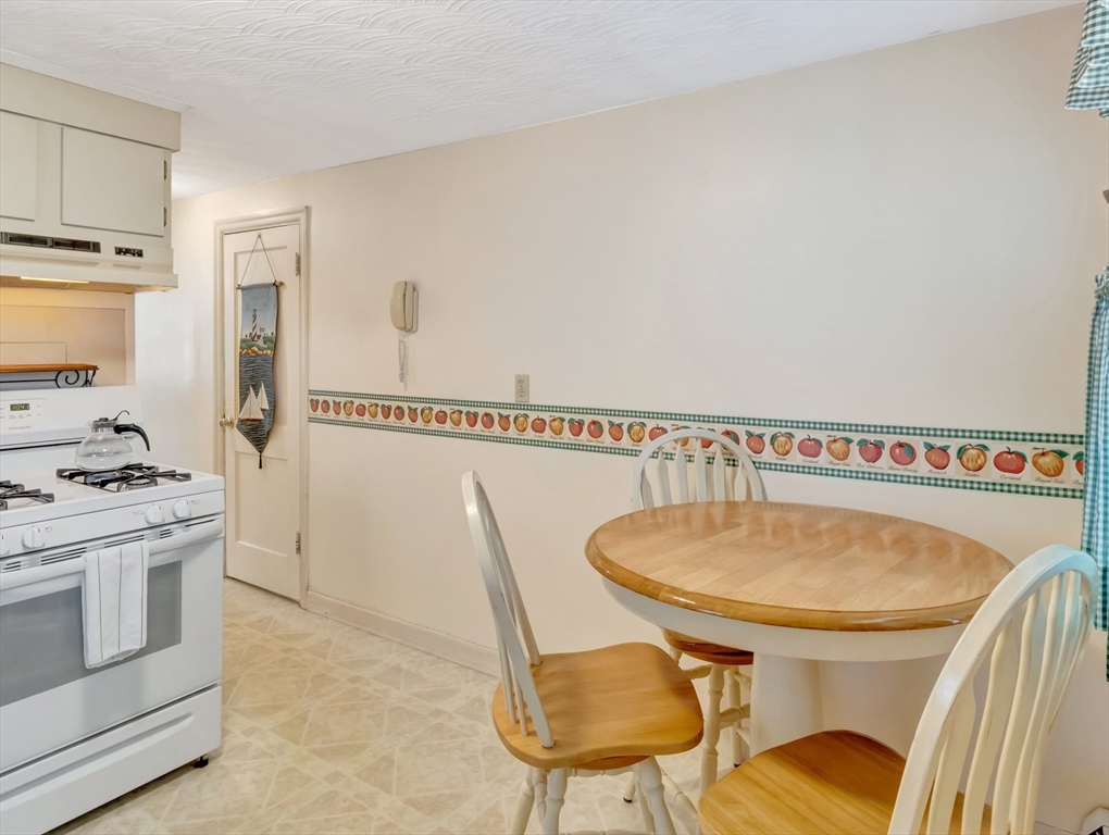5 G Street Hull, MA 02045 - Photo 22 of 41 a kitchen with a table and chairs