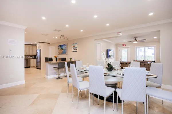 a room that has a table and a chair in it
