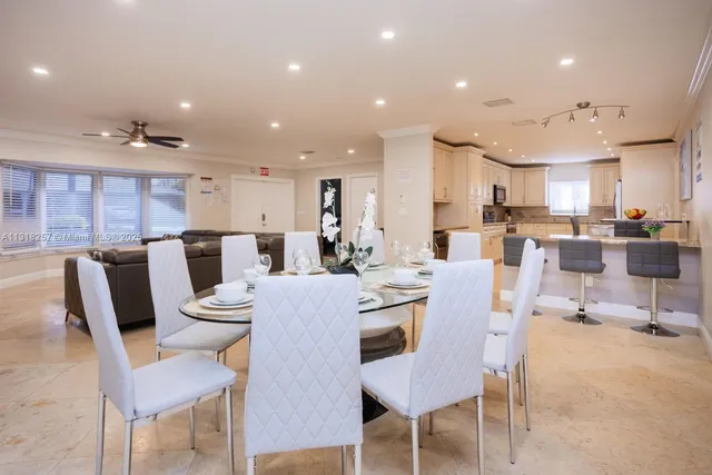 a room that has a table and a chair in it