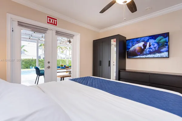 a bathroom with a glass door shower