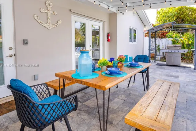 a front view of house with small garden