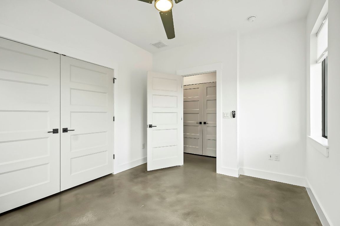 1104 Marcy Street, Unit B Austin, TX 78745 - Photo 24 of 38 an empty room with closet