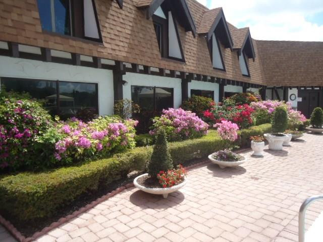 3670 Inverrary Drive, Unit 2C Lauderhill, FL 33319 - Photo 15 of 21 a front view of a house with a yard