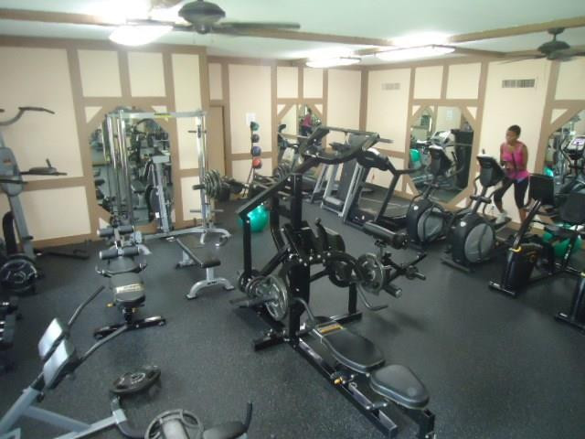 3670 Inverrary Drive, Unit 2C Lauderhill, FL 33319 - Photo 19 of 21 a view of a room with gym equipment