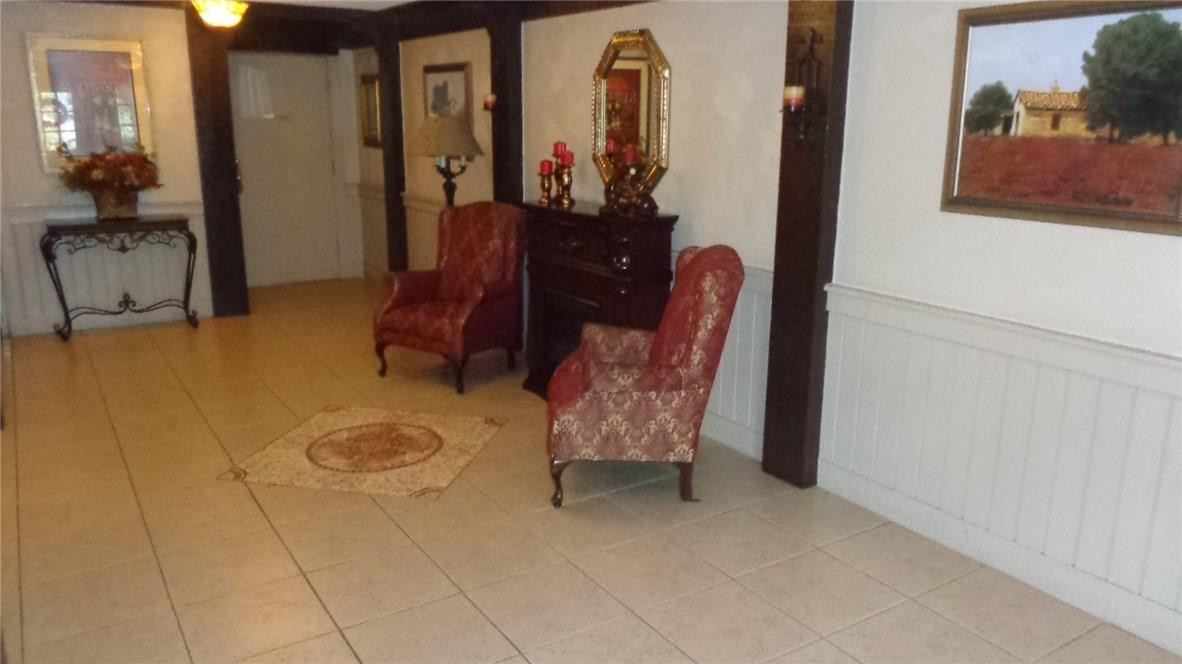 3670 Inverrary Drive, Unit 2C Lauderhill, FL 33319 - Photo 2 of 21 view of living room with furniture