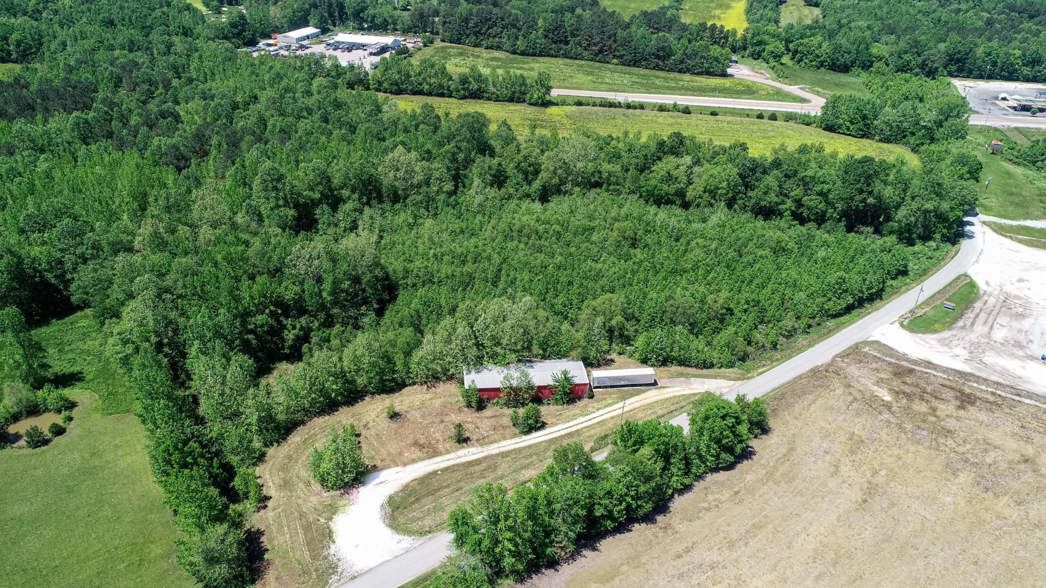 198 McIllwain Road Holladay, TN 38341 - Photo 18 of 28 a view of a yard with a house