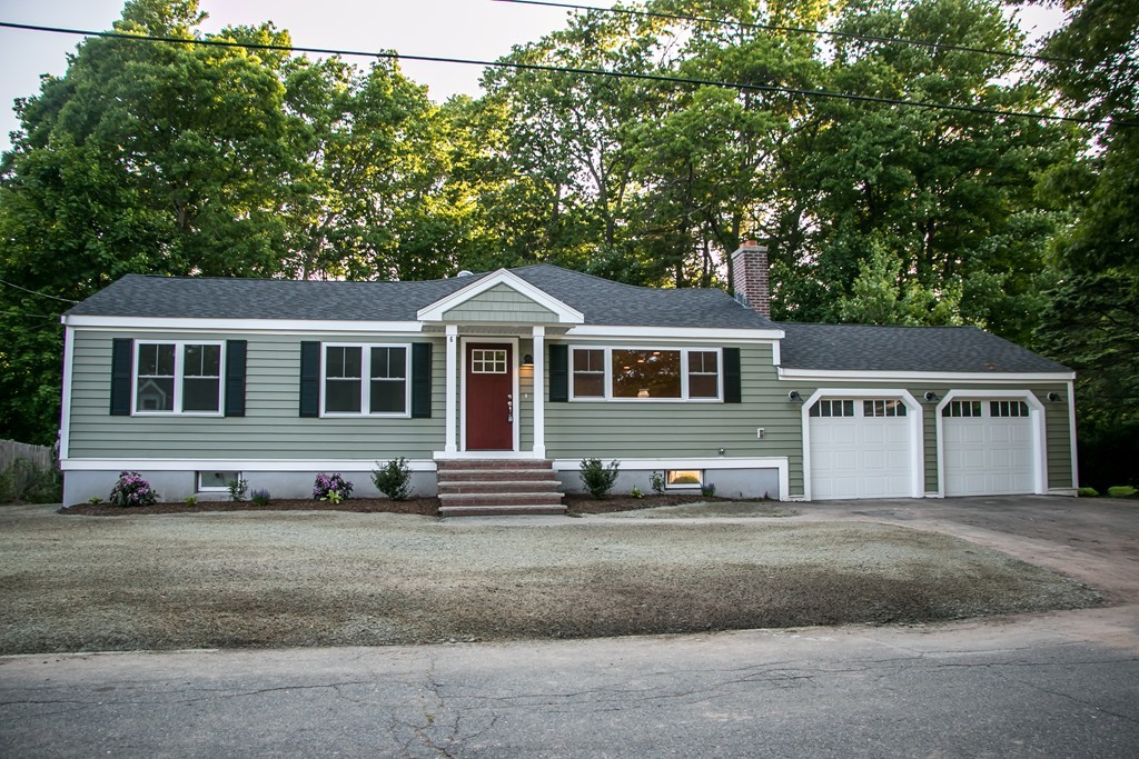 6 Walnut Road Chelmsford, MA 01824 - Photo 1 of 23 a front view of a house with a yard