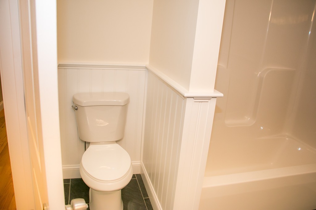 6 Walnut Road Chelmsford, MA 01824 - Photo 12 of 23 a bathroom with a toilet and a sink