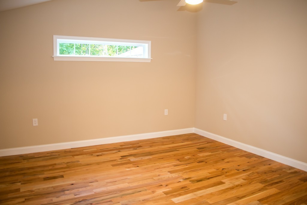 6 Walnut Road Chelmsford, MA 01824 - Photo 16 of 23 a view of an empty room with wooden floor