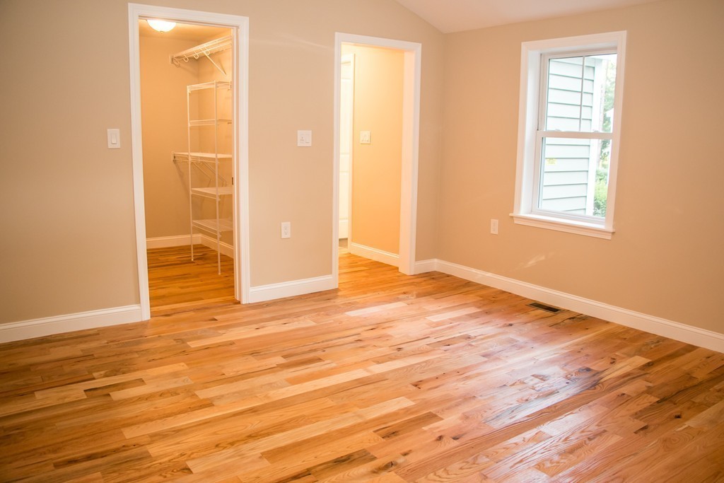 6 Walnut Road Chelmsford, MA 01824 - Photo 17 of 23 an empty room with wooden floor and windows