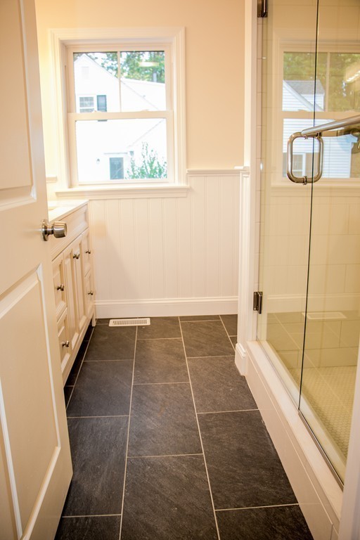 6 Walnut Road Chelmsford, MA 01824 - Photo 20 of 23 a bathroom with a tub shower and a sink