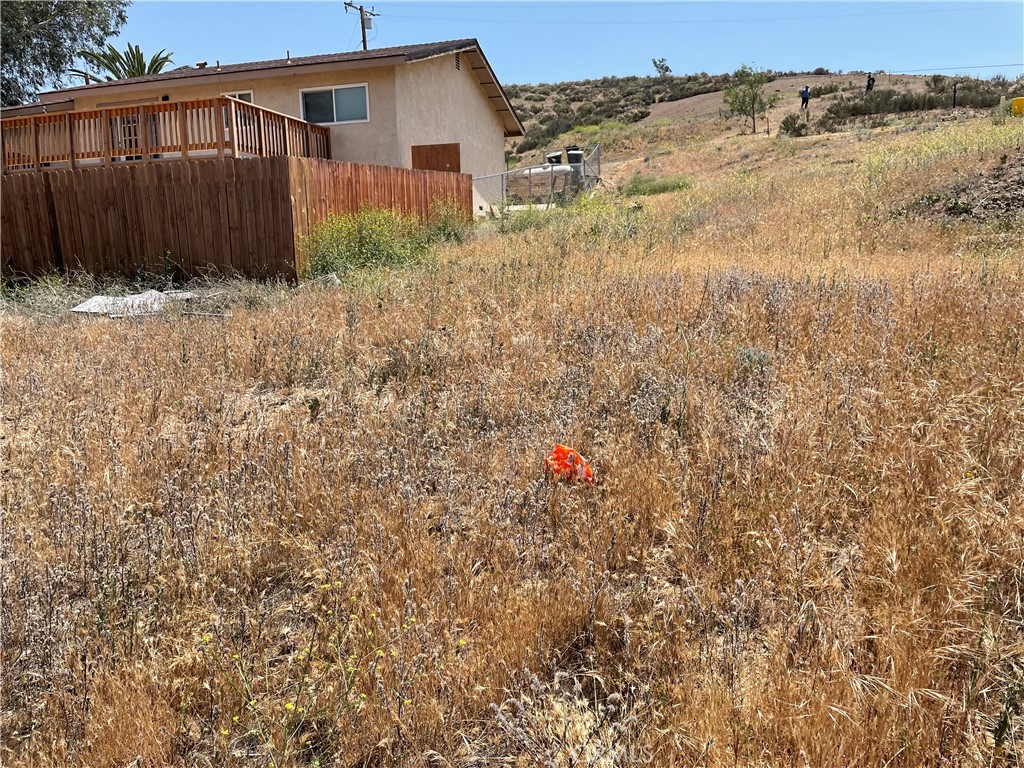 16 Riverside Drive Lake Elsinore, CA 92530 - Photo 21 of 34 a view of a house with a yard