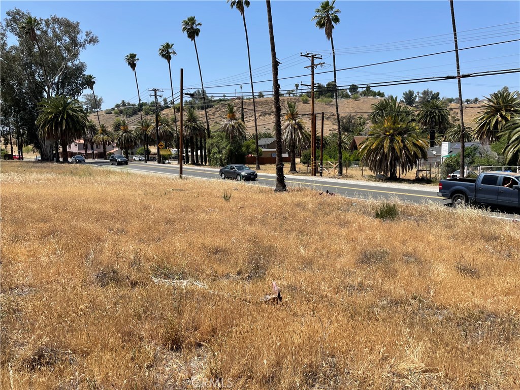 16 Riverside Drive Lake Elsinore, CA 92530 - Photo 6 of 34 a view of a street with a building in the background
