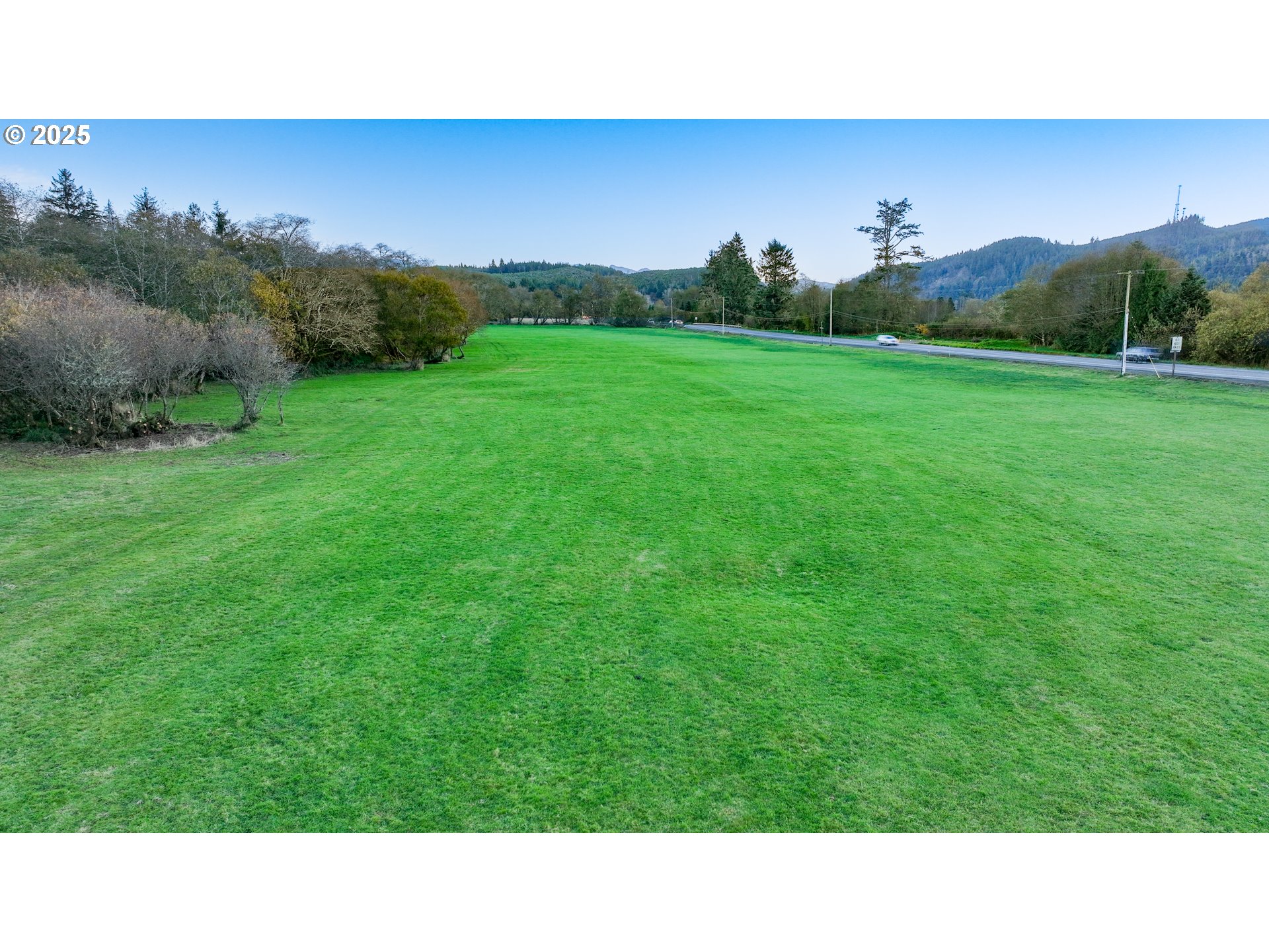 85863 Highway 101 Seaside, OR 97138 - Photo 9 of 23 a open area with trees in the background