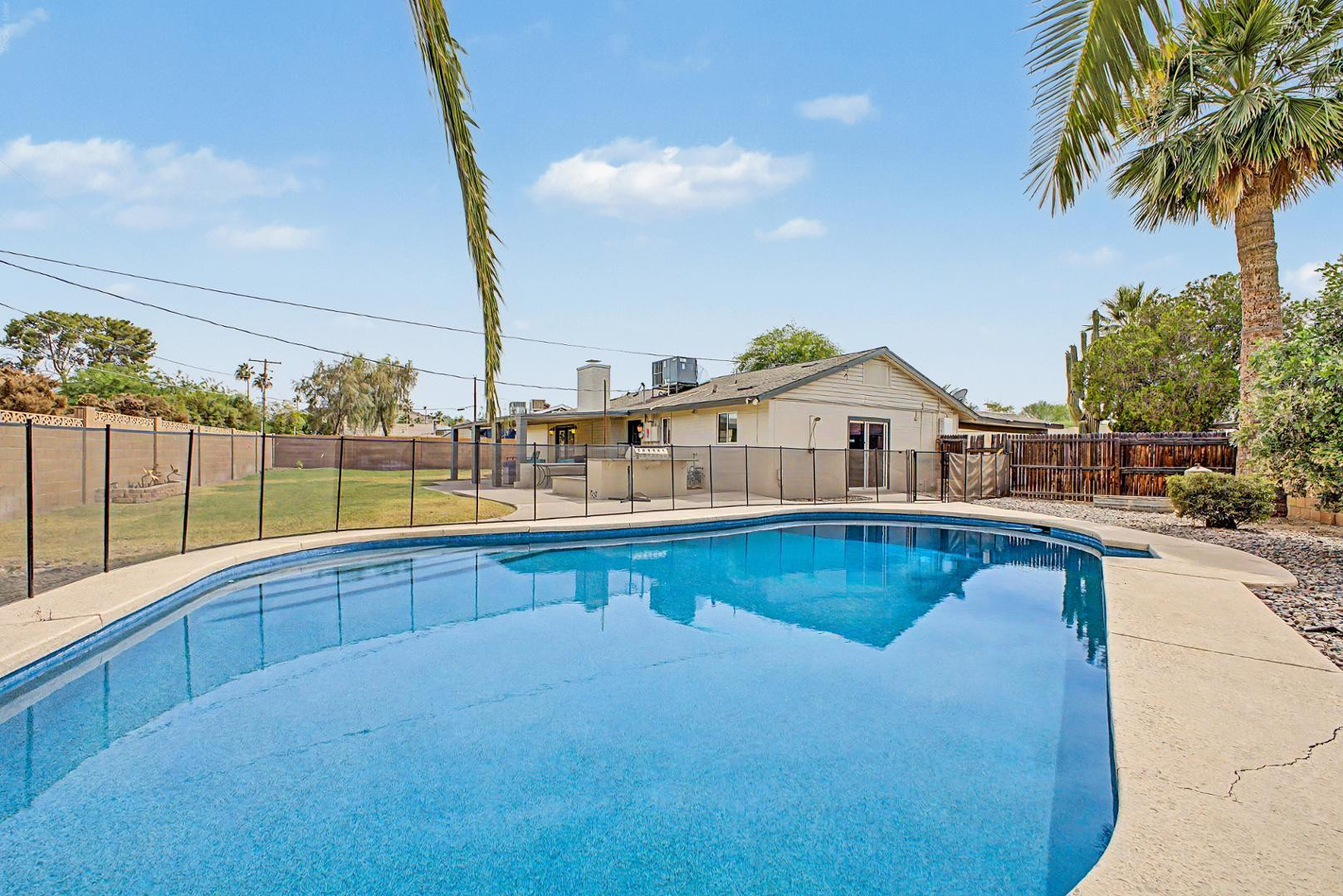 3346 East Cochise Road Phoenix, AZ 85028 - Photo 40 of 40 a view of a house with a swimming pool