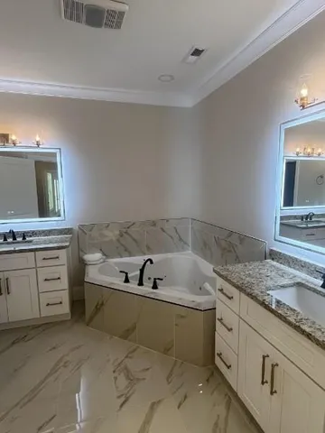 a close view of light fixtures and stairs