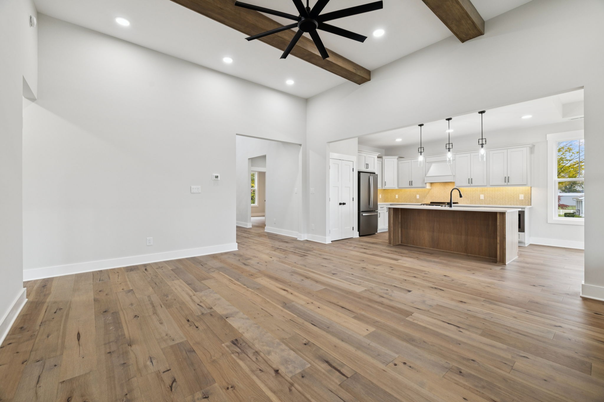3151 Sulphur Springs Road Clarksville, TN 37043 - Photo 14 of 94 a view of a kitchen with a sink and a ceiling fan
