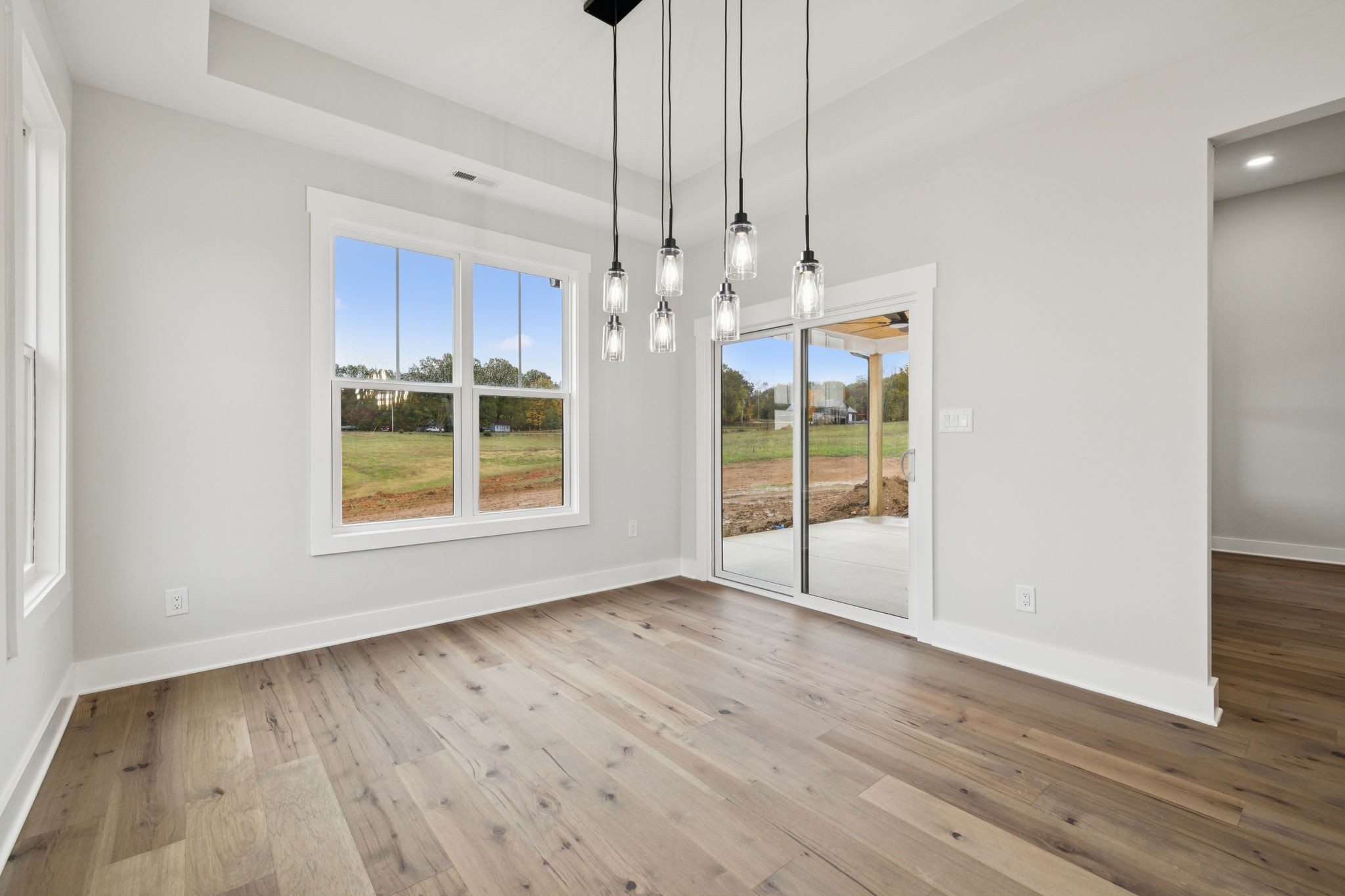 3151 Sulphur Springs Road Clarksville, TN 37043 - Photo 37 of 94 a view of an empty room with wooden floor and a window