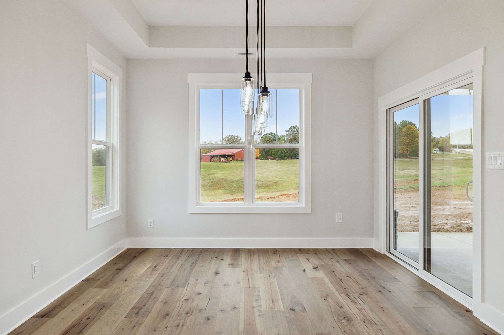 3151 Sulphur Springs Road Clarksville, TN 37043 - Photo 38 of 94 a view of an empty room with wooden floor and a window