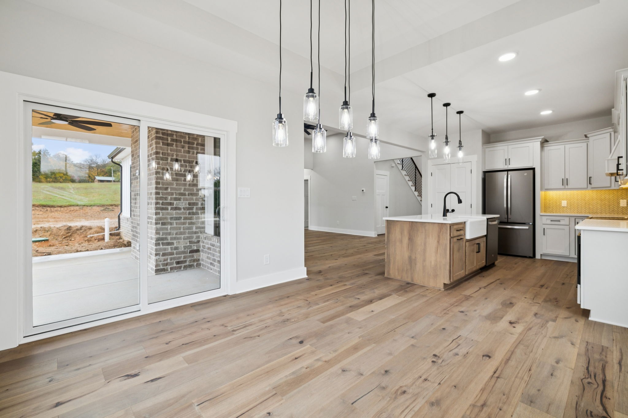 3151 Sulphur Springs Road Clarksville, TN 37043 - Photo 40 of 94 a view of a kitchen with wooden floor and a window