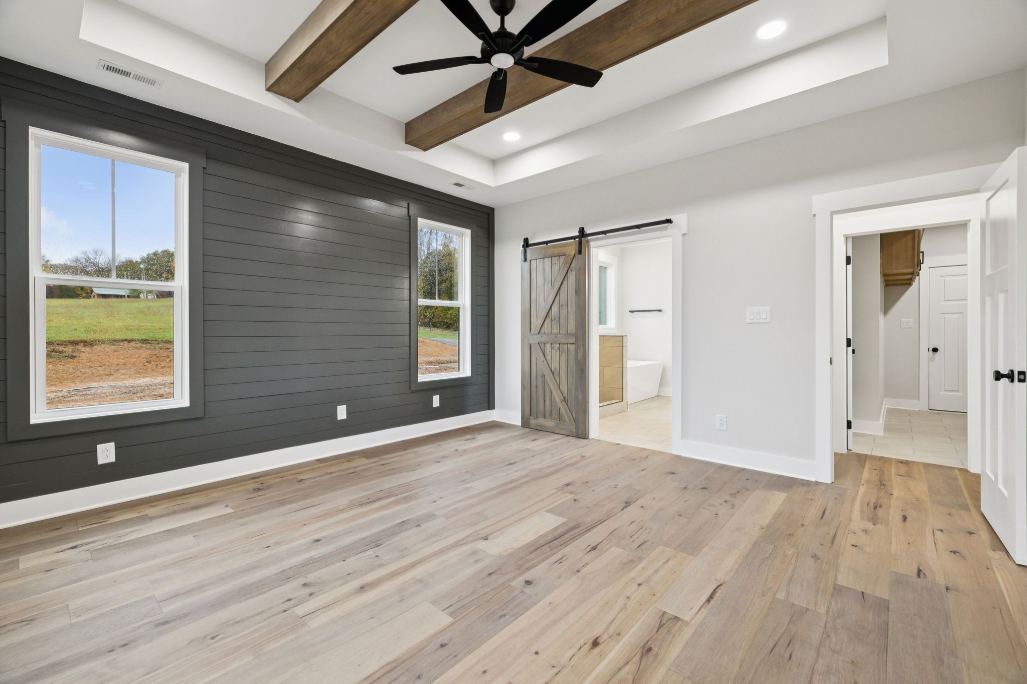 3151 Sulphur Springs Road Clarksville, TN 37043 - Photo 48 of 94 a view of an empty room with wooden floor and a window