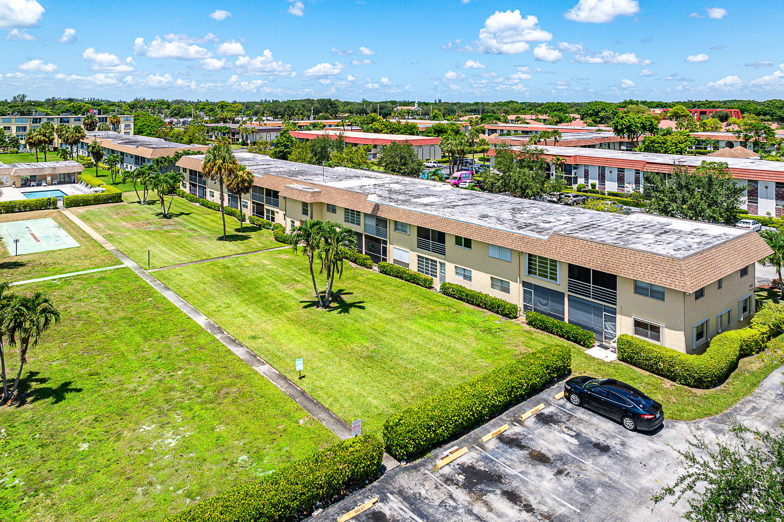 9855 Sandalfoot Boulevard, Unit 305 Boca Raton, FL 33428 - Photo 13 of 17 Rear Exterior Aerial