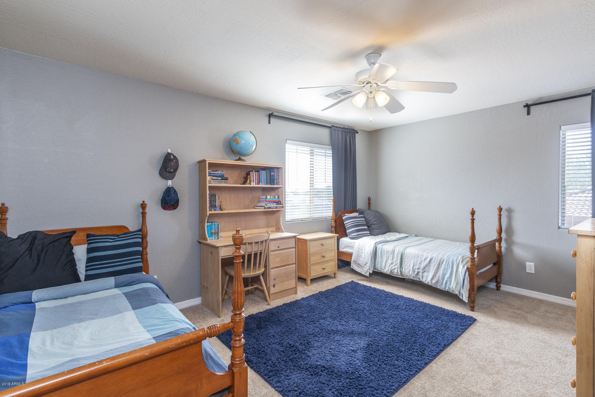 16770 West Rowel Road Surprise, AZ 85387 - Photo 25 of 34 a bed room with furniture and a rug