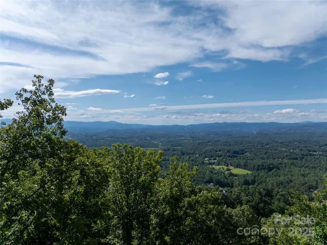 a view of mountain view with mountains in the background