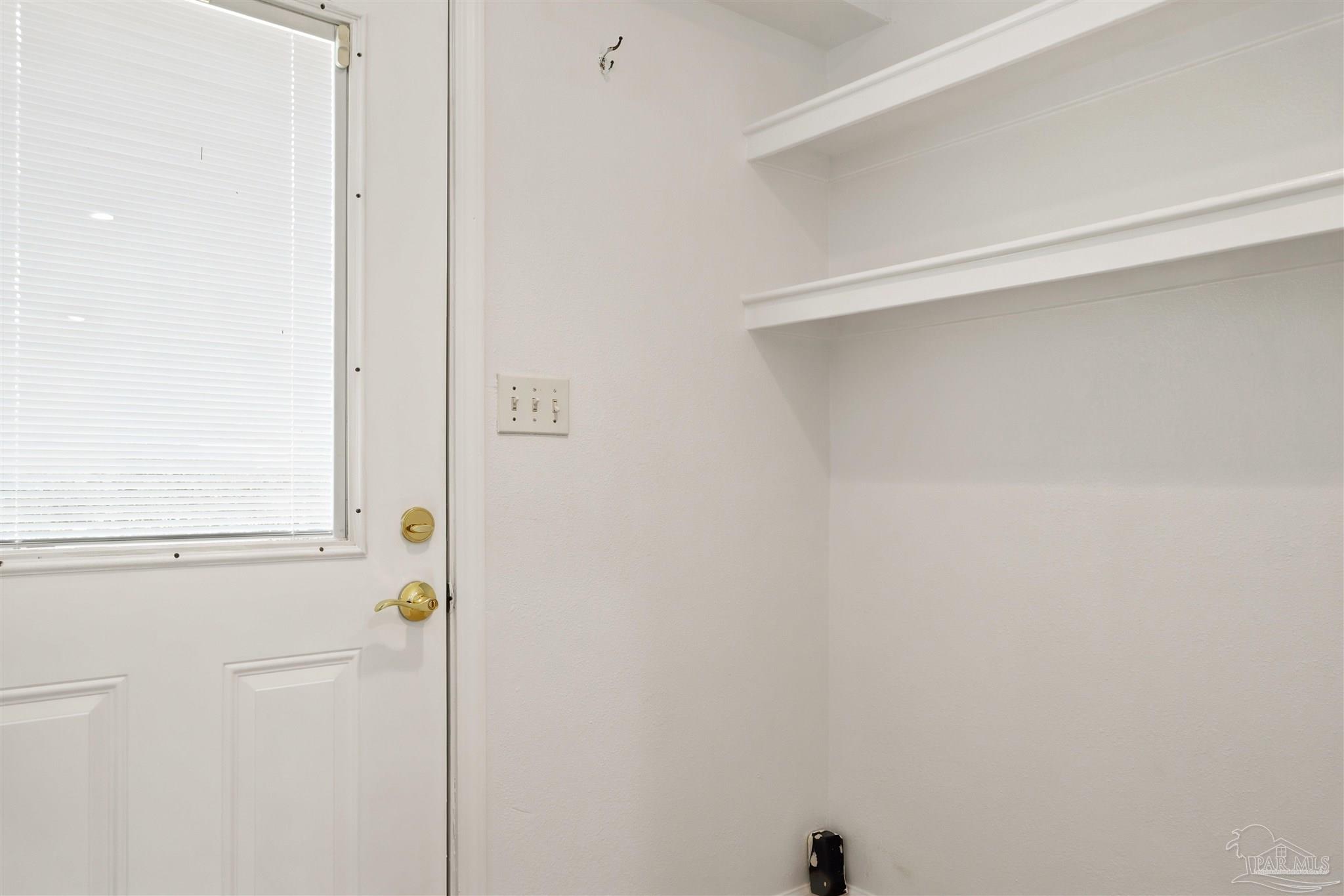 101 Vanderbilt Road Pensacola, FL 32506 - Photo 31 of 33 Indoor laundry room, exterior door