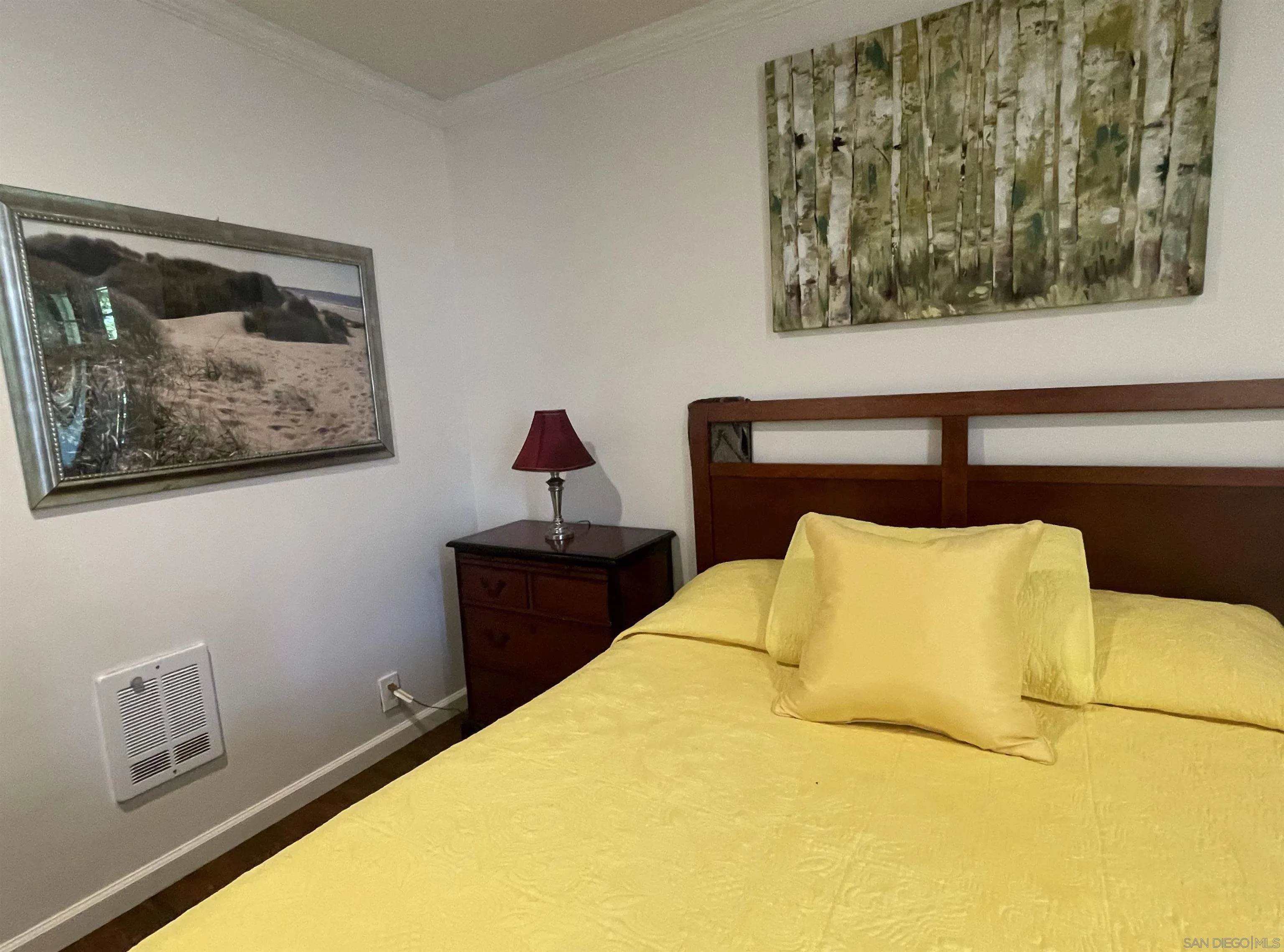2510 Torrey Pines Road, Unit 413 La Jolla, CA 92037 - Photo 13 of 15 a bedroom with a bed and wall painting