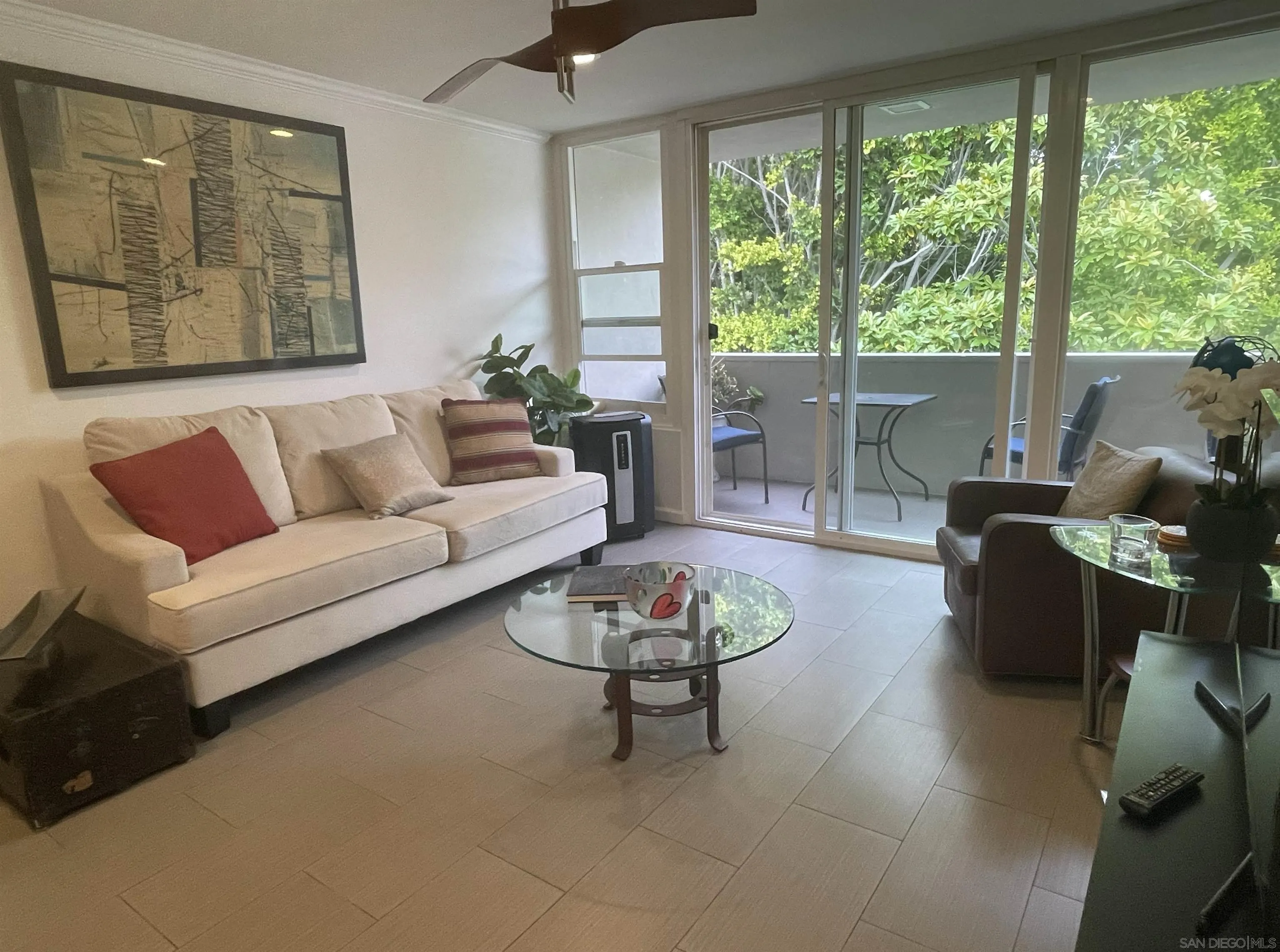 2510 Torrey Pines Road, Unit 413 La Jolla, CA 92037 - Photo 2 of 15 a living room with furniture and a potted plant