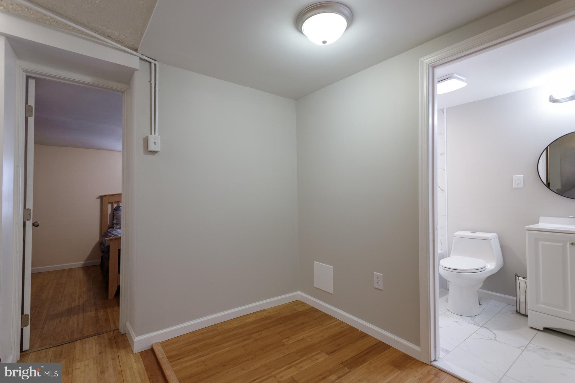 108 Roxborough Avenue Philadelphia, PA 19127 - Photo 13 of 21 a bathroom with a toilet and a vanity