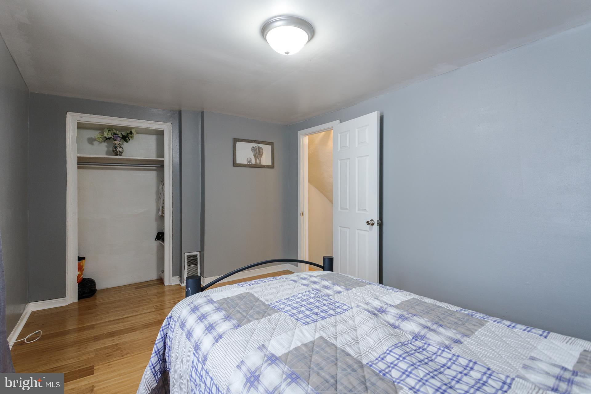 108 Roxborough Avenue Philadelphia, PA 19127 - Photo 15 of 21 a bedroom with a bed and a window